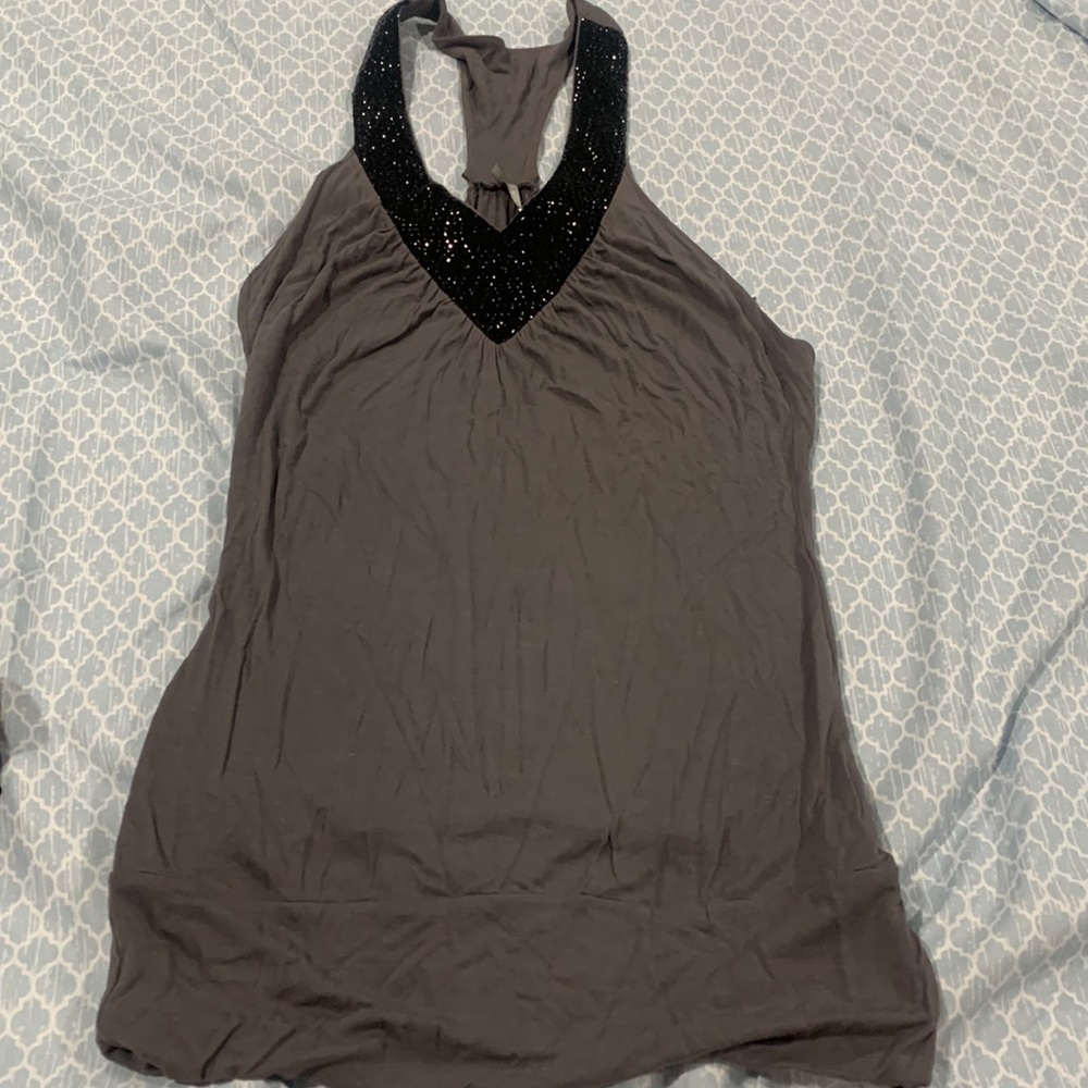 Max Rave Size Small Gray with Black Embellishment top. Low cut on sides.